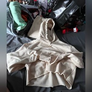 light pink crop top and sweatpants